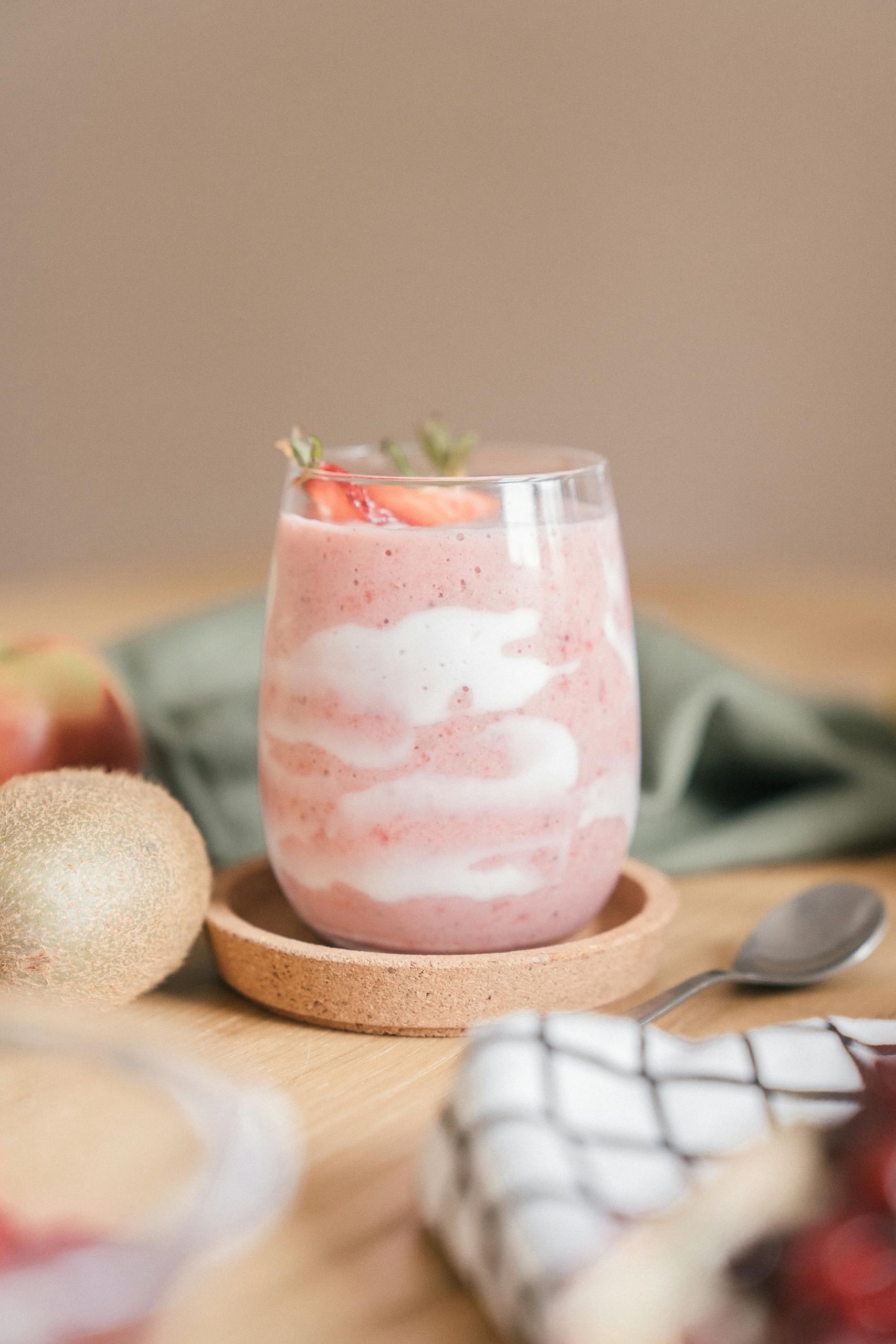 kefir benefits: Creamy strawberry yogurt parfait with fresh fruit and toppings. Perfect for a healthy breakfast or snack.