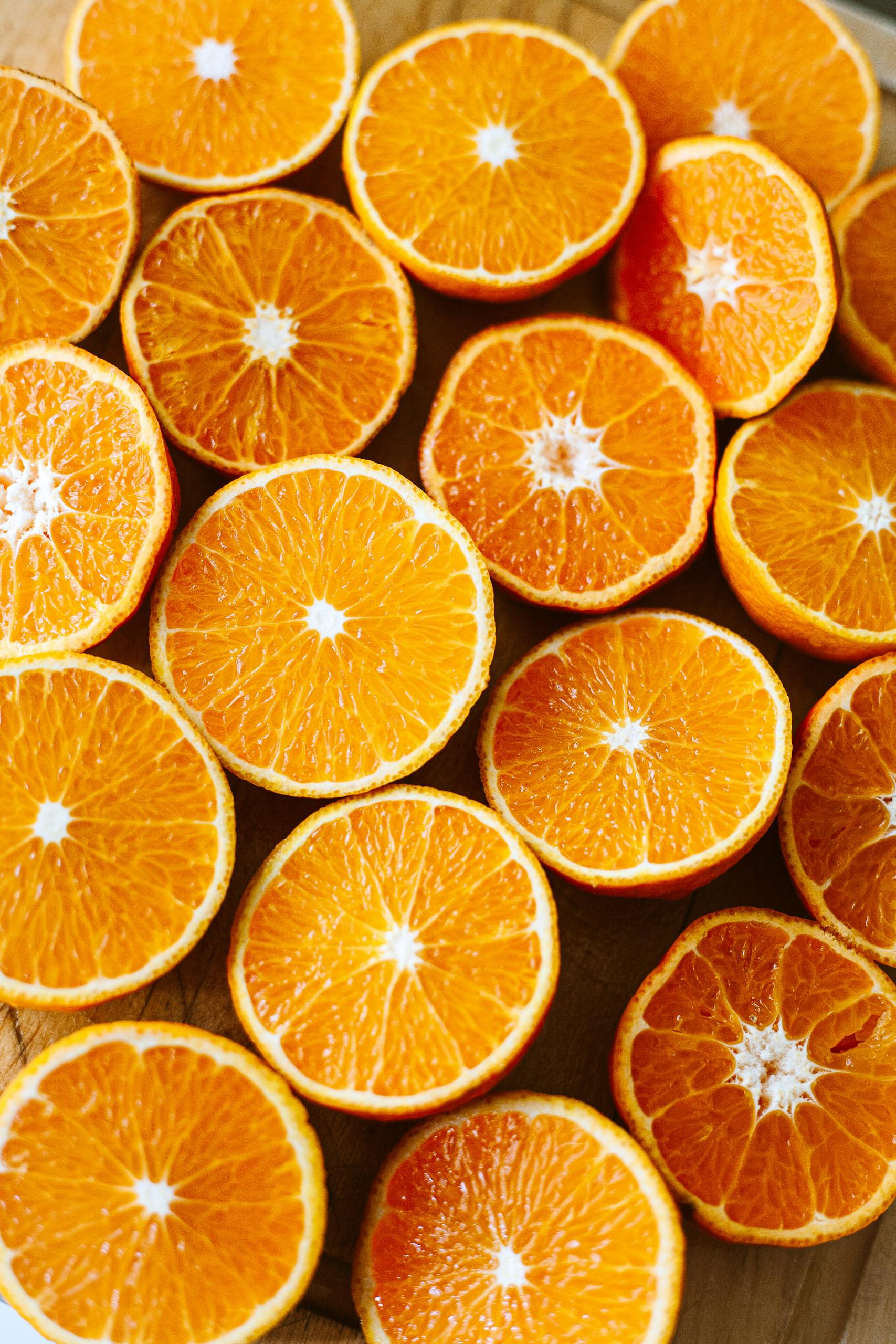 potassium-rich foods for blood pressure: A close-up shot of fresh sliced oranges showcasing their vibrant color and juicy freshness.