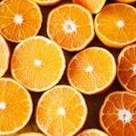 Close-up of sliced juicy oranges showcasing vibrant colors and fresh texture.