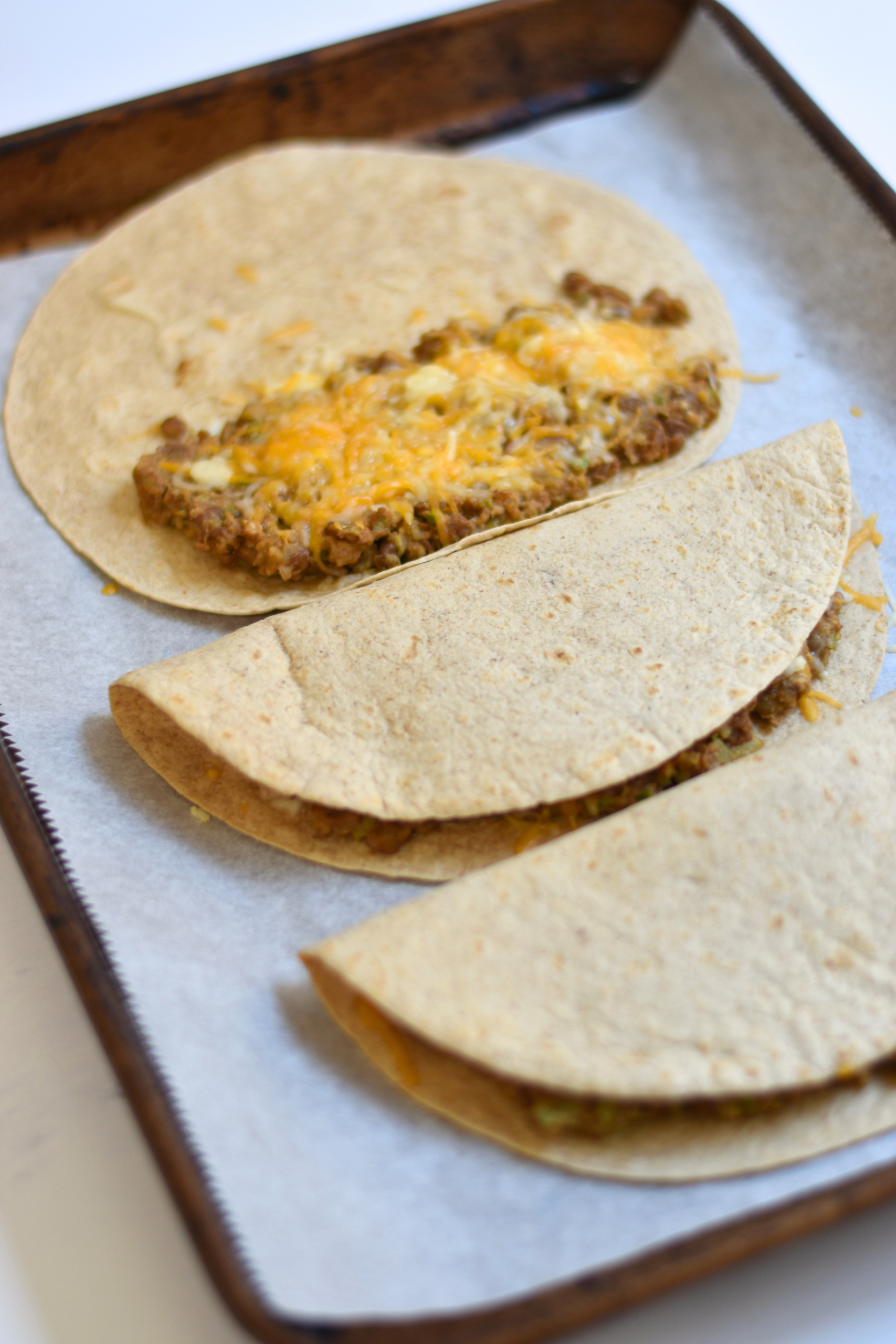 Cheesy Walnut and Lentil Baked Tacos