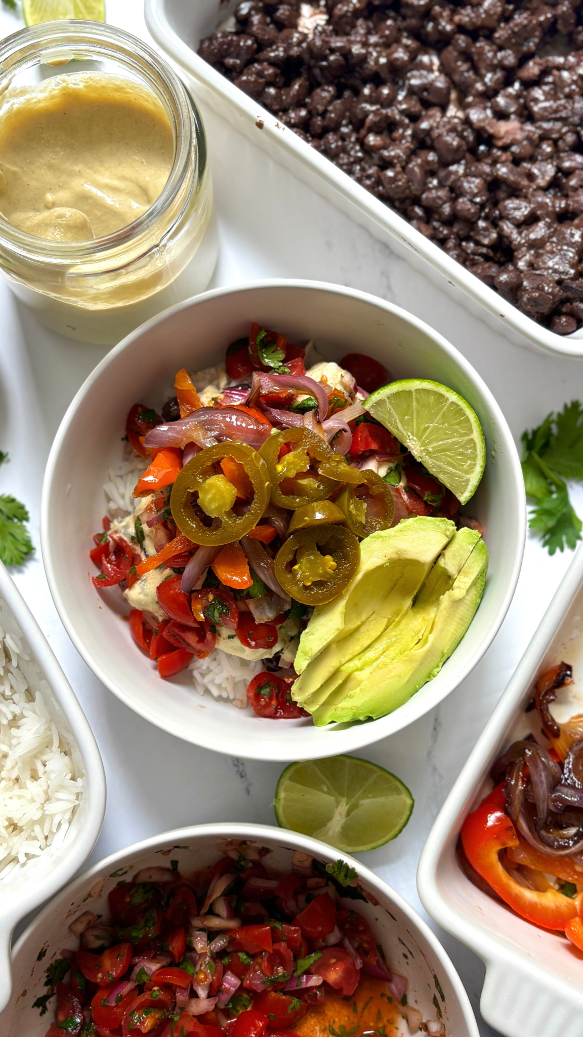 Black Bean Burrito Bowls with Creamy Cashew Sauce