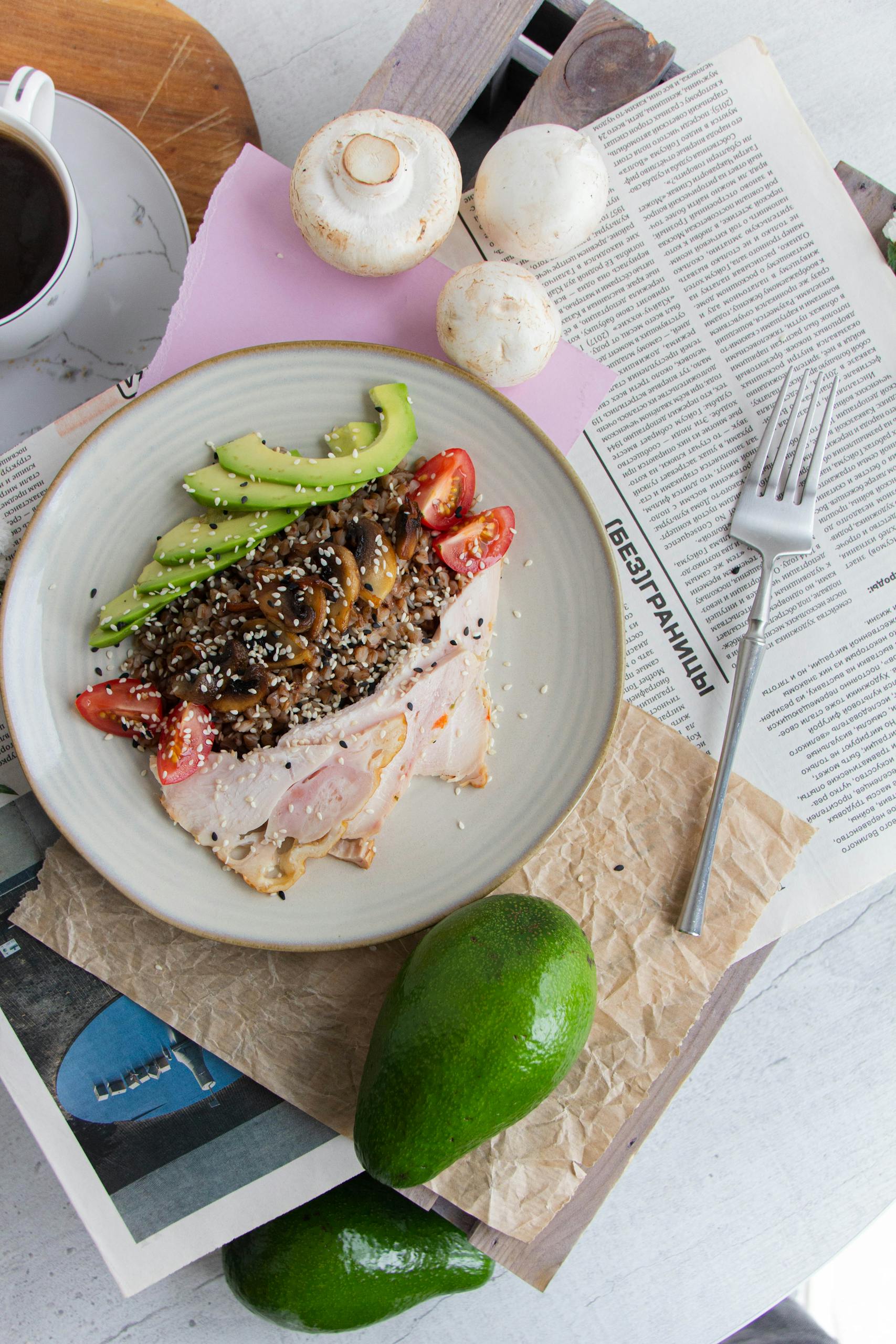 why fad diets cause weight regain: Top view of a balanced meal with turkey, avocado, mushrooms, and more on a plate.