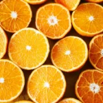 Close-up of sliced juicy oranges showcasing vibrant colors and fresh texture.