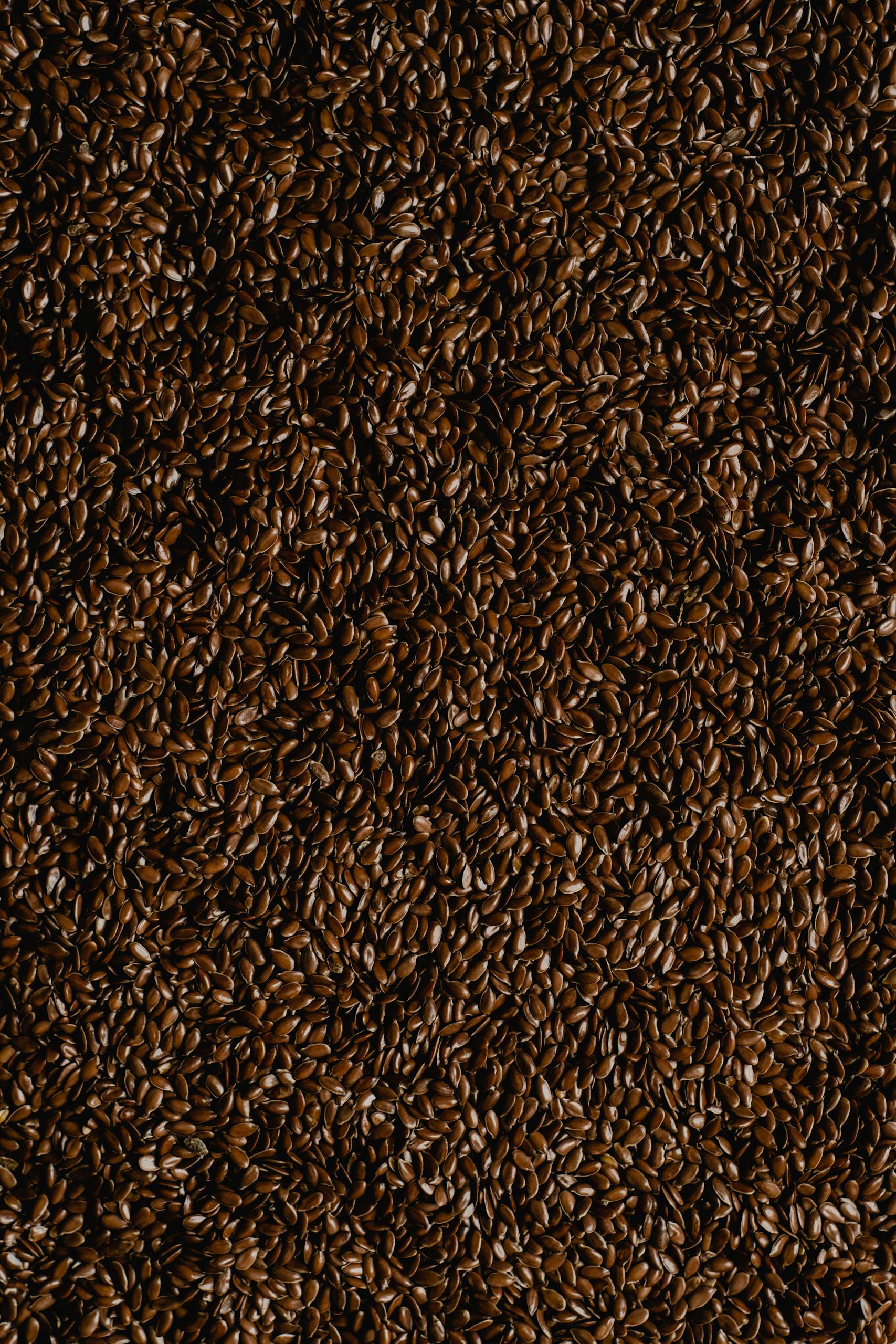flaxseed benefits: Close-up shot of brown flaxseeds, ideal for food photography and texture backgrounds.