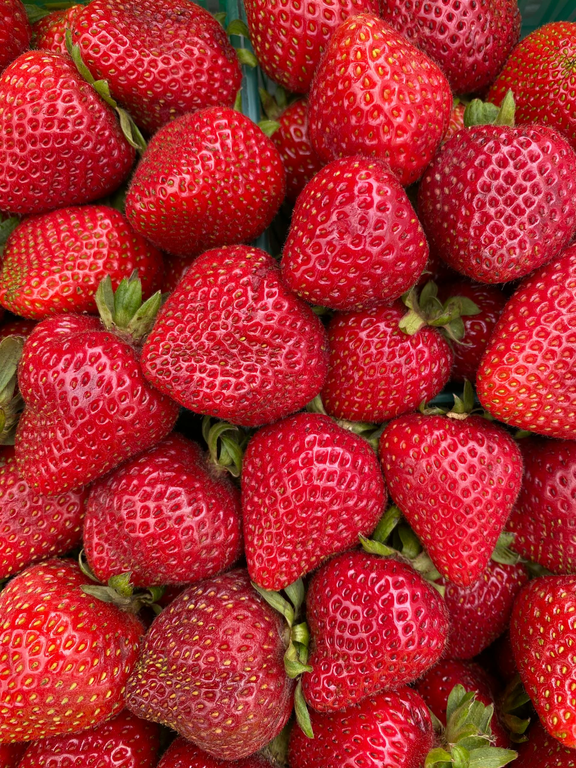 What Is the MIND Diet: Close-up of vibrant red strawberries showcasing their freshness and juiciness, perfect for healthy eating concepts.