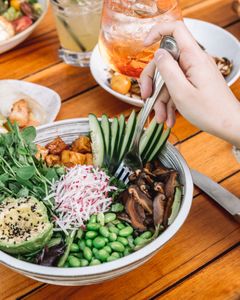 What to Order at True Food Kitchen: Colorful vegetarian salad with tofu, avocado, and more for a healthy meal.