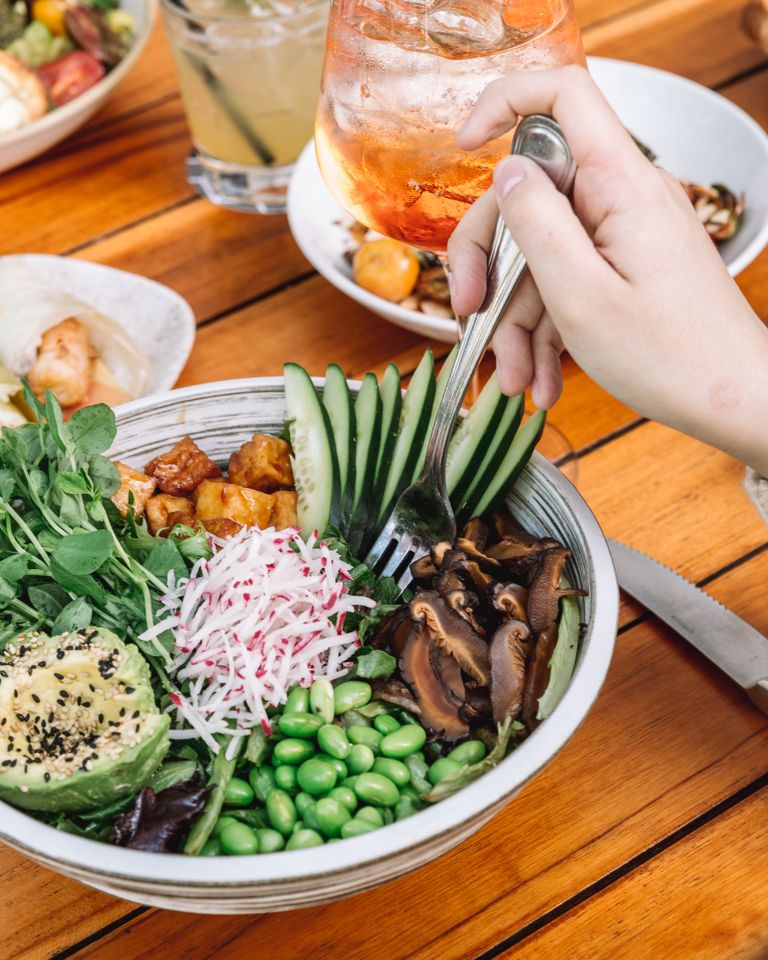 What to Order at True Food Kitchen: Colorful vegetarian salad with tofu, avocado, and more for a healthy meal.